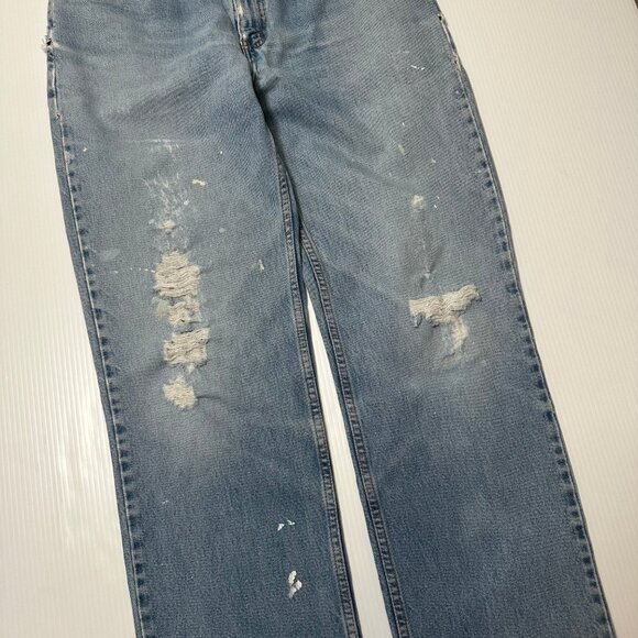 Vintage Levi's Light Wash Distressed Denim 33 - Picture 3 of 6